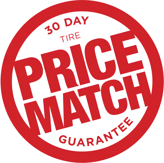 30-day tire price match guarantee badge in bold red font, emphasizing value and commitment to competitive pricing.