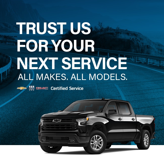 Chevrolet truck on a scenic road with text: "Trust us for your next service. All makes. All models."