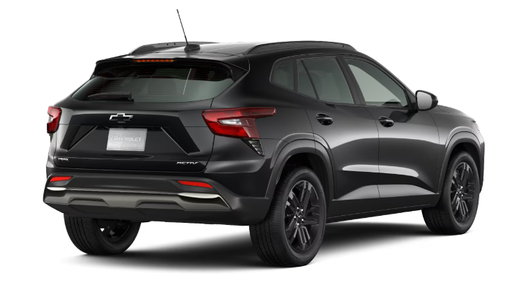 Rear view of a red Buick Envision SUV, showcasing its modern design and taillights.