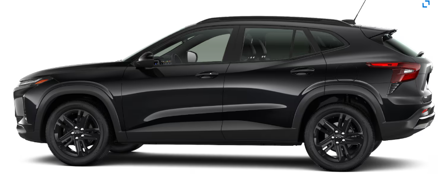 Rear view of a black Buick Envision Avenir SUV with sleek design and dual exhausts.